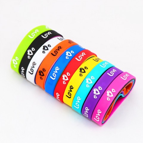 Silicone Wrist Cuff Bracelets Pack of 100 - Multicolor Elastic Styles for Men and Women - Jesus Cross, Skull, Peace, Butterfly